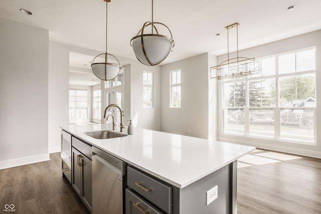 401 Jersey St, Westfield, IN 46074 - kitchen with a healthy amount of sunlight, a sink, dark wood-type flooring, and dishwasher