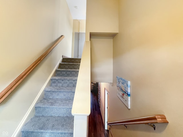 1026 Jackson St, Columbus, IN 47201 - stairway with wood finished floors