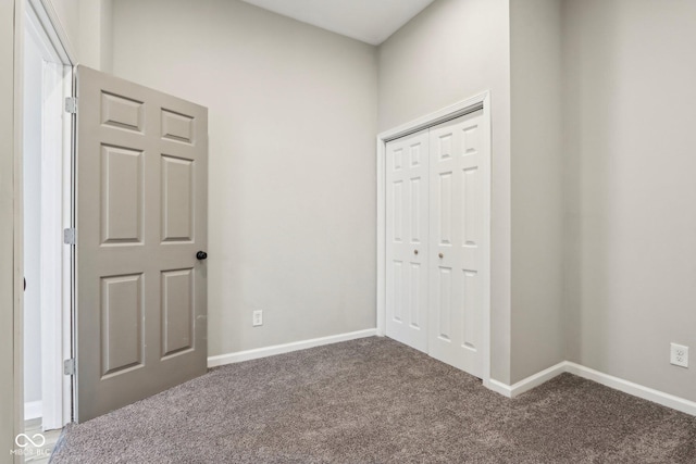 202 Mckim Ave, Indianapolis, IN 46201 - unfurnished bedroom featuring carpet flooring, baseboards, and a closet