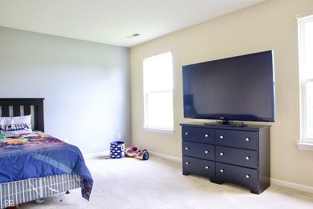 1831 Brook Crossing Way, Indianapolis, IN 46229 - bedroom featuring baseboards, light carpet, and visible vents