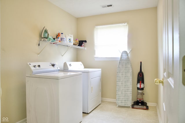 1831 Brook Crossing Way, Indianapolis, IN 46229 - laundry room featuring baseboards, laundry area, washing machine and dryer, and visible vents
