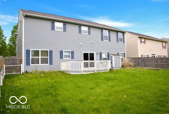 1831 Brook Crossing Way, Indianapolis, IN 46229 - rear view of house with a lawn, a fenced backyard, and a wooden deck