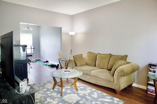 1831 Brook Crossing Way, Indianapolis, IN 46229 - living room with baseboards, wood finished floors, and a chandelier