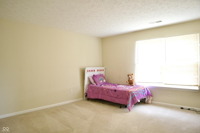 1831 Brook Crossing Way, Indianapolis, IN 46229 - bedroom with carpet floors, a textured ceiling, baseboards, and visible vents