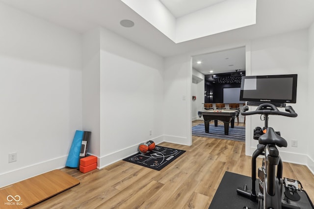 11064 Hamilton Run, Zionsville, IN 46077 - exercise room featuring wood finished floors, billiards, and baseboards