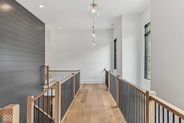 11064 Hamilton Run, Zionsville, IN 46077 - hall with an upstairs landing, light wood-type flooring, recessed lighting, and baseboards