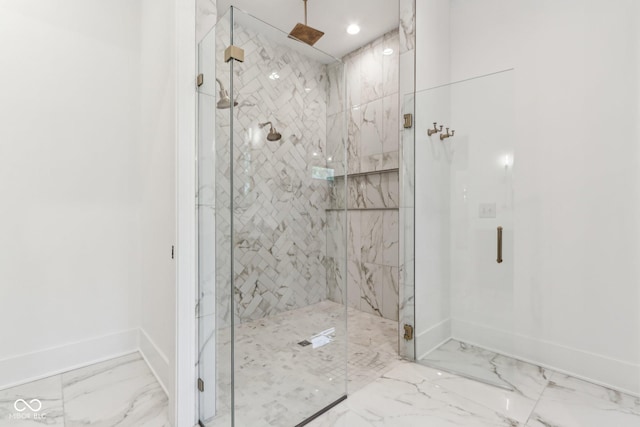 11064 Hamilton Run, Zionsville, IN 46077 - bathroom featuring marble finish flooring, baseboards, and a marble finish shower