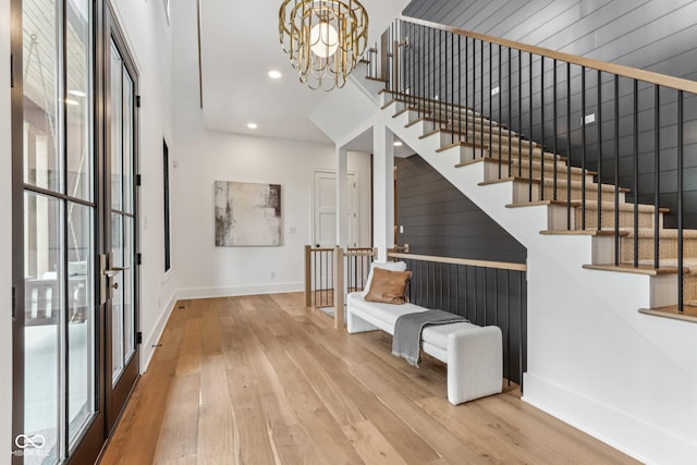 11064 Hamilton Run, Zionsville, IN 46077 - entrance foyer with hardwood / wood-style floors, stairway, baseboards, a chandelier, and recessed lighting