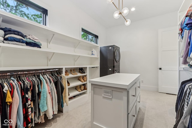 11064 Hamilton Run, Zionsville, IN 46077 - walk in closet featuring stacked washer / drying machine and light colored carpet
