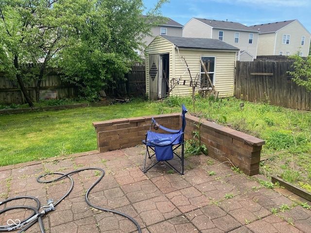 2350 Harvest Moon Dr, Greenwood, IN 46143 - view of patio / terrace featuring an outbuilding, a shed, and a fenced backyard