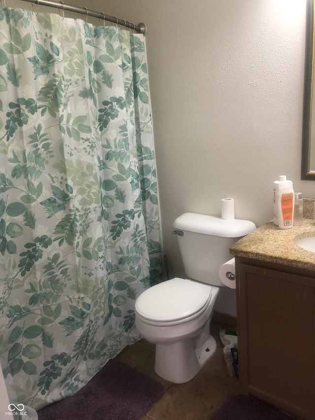 2350 Harvest Moon Dr, Greenwood, IN 46143 - full bath featuring vanity, tile patterned floors, a shower with curtain, and toilet