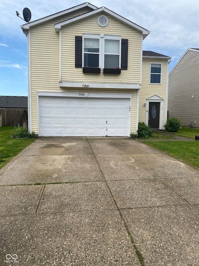 2350 Harvest Moon Dr, Greenwood, IN 46143 - traditional home with driveway and a garage