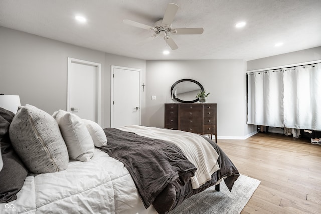 2823 Somerset Bay, Indianapolis, IN 46240 - bedroom with recessed lighting, light wood-style floors, and a ceiling fan