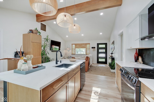 kitchen featuring electric range, a sink, beamed ceiling, recessed lighting, and stainless steel dishwasher