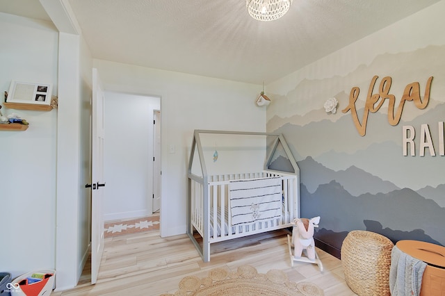 bedroom with wood finished floors