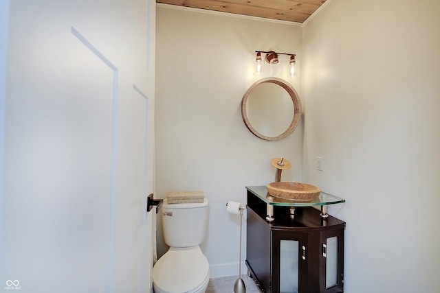 half bath with toilet and vanity
