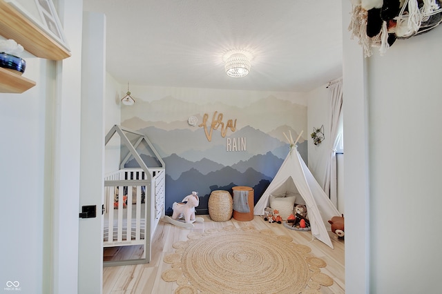 bedroom featuring wood finished floors