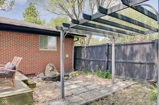 view of patio / terrace with fence and a pergola