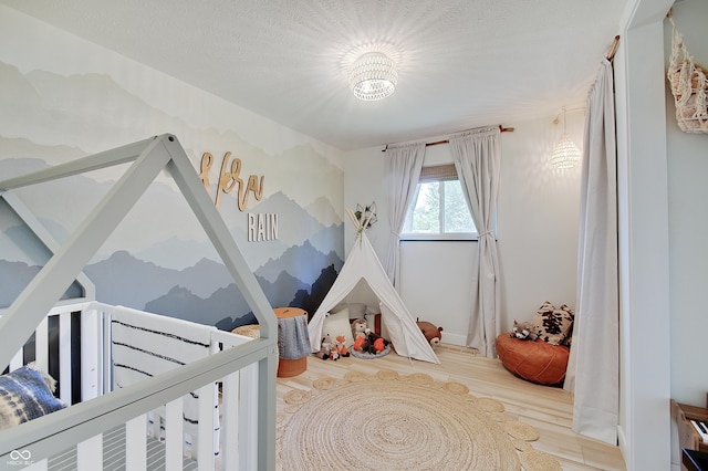 bedroom featuring wood finished floors