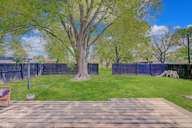 view of yard featuring a deck