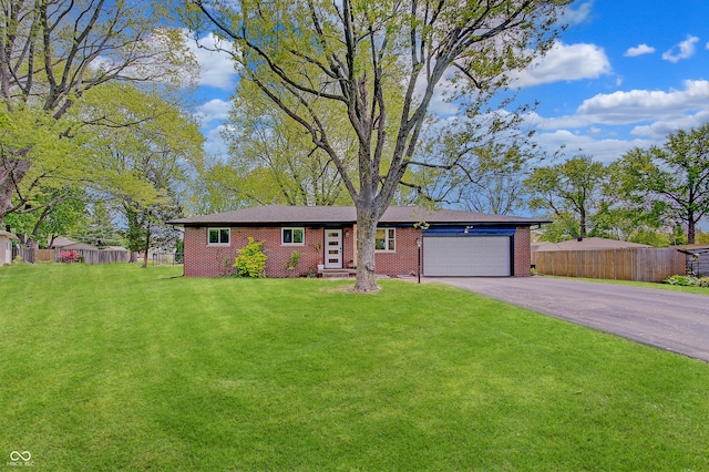 ranch-style home with asphalt driveway, a garage, and brick siding