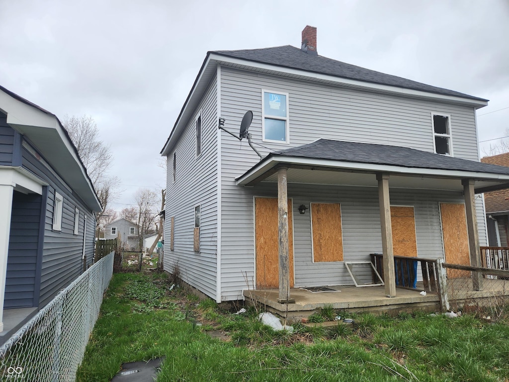 306-308 S Temple Ave, Indianapolis, IN 46201 - view of front of house featuring a porch and a chimney