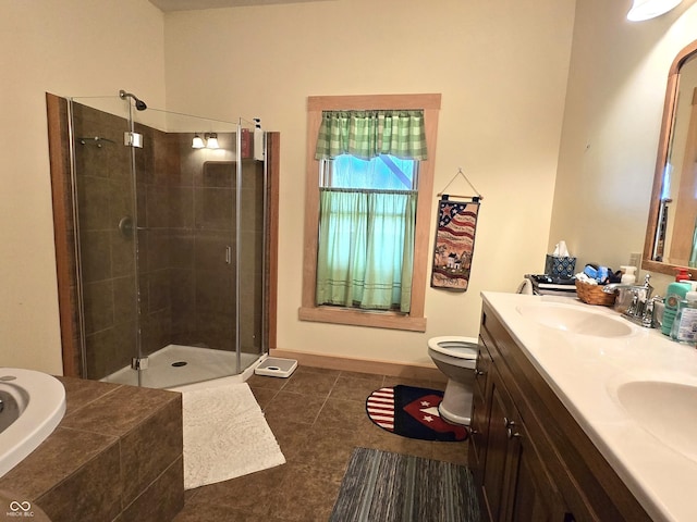 bathroom with a shower stall, tile patterned flooring, double vanity, tiled tub, and toilet