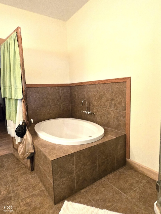 bathroom featuring a bath