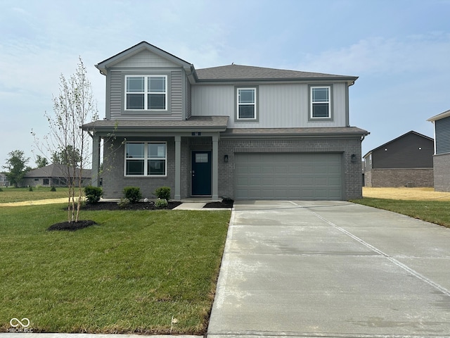 50 Benfield Dr, Whiteland, IN 46184 - view of front facade featuring an attached garage, driveway, a front yard, brick siding, and roof with shingles