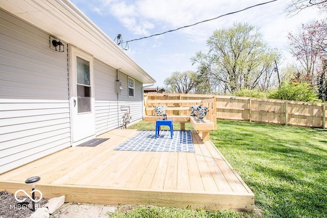 wooden deck with fence private yard and a yard