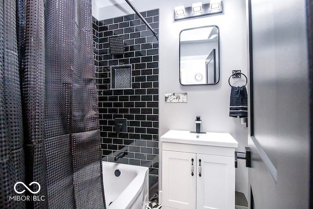 bathroom with vanity and shower / bathtub combination with curtain