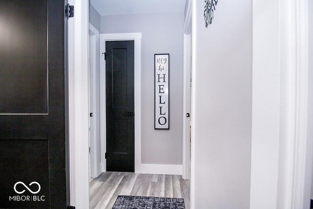hall featuring light wood-style flooring