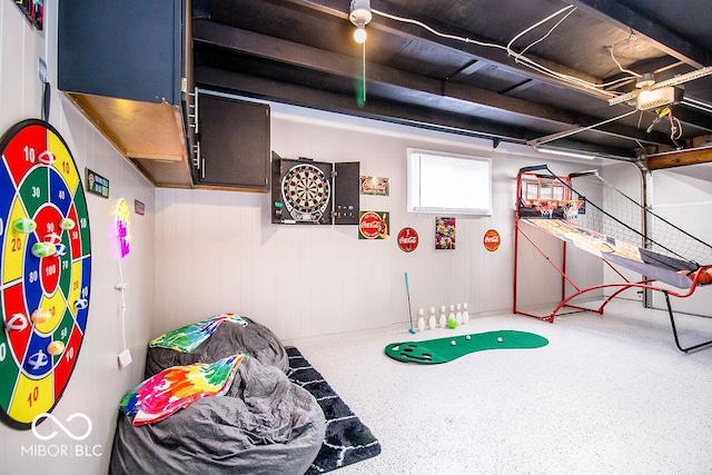 game room featuring speckled floor
