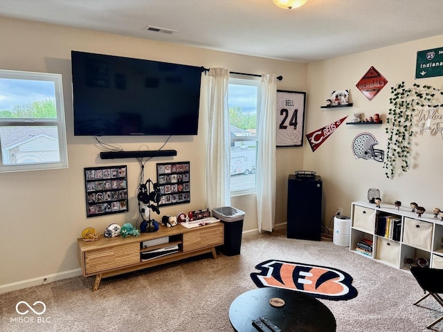 playroom featuring baseboards, visible vents, and carpet