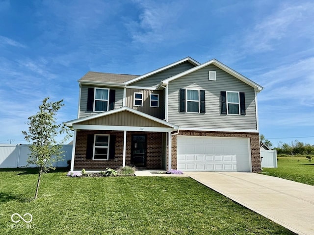 view of front of property with driveway, a front yard, a garage, brick siding, and fence