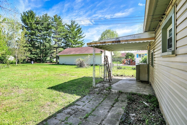 view of yard featuring a patio area and fence