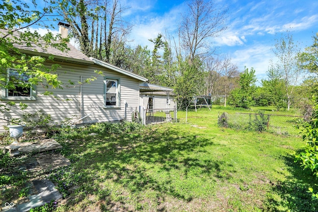 view of yard with fence