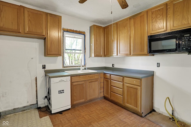 kitchen featuring brown cabinets, white dishwasher, black microwave, a textured ceiling, and a ceiling fan