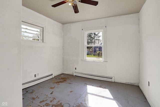 empty room with a ceiling fan and a baseboard radiator