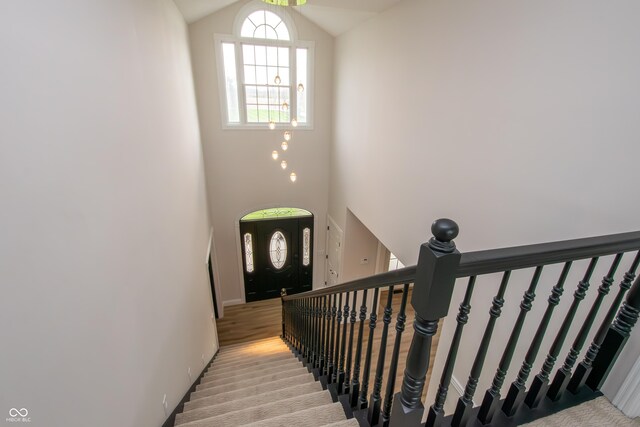 12520 E Stanley Rd, Selma, IN 47383 - stairs with high vaulted ceiling