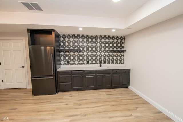 12520 E Stanley Rd, Selma, IN 47383 - interior space featuring visible vents, baseboards, recessed lighting, light wood-type flooring, and a sink