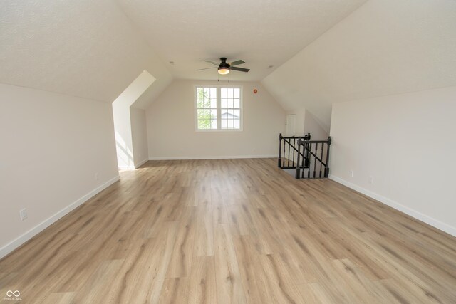 12520 E Stanley Rd, Selma, IN 47383 - bonus room with light wood-style floors, baseboards, ceiling fan, and vaulted ceiling