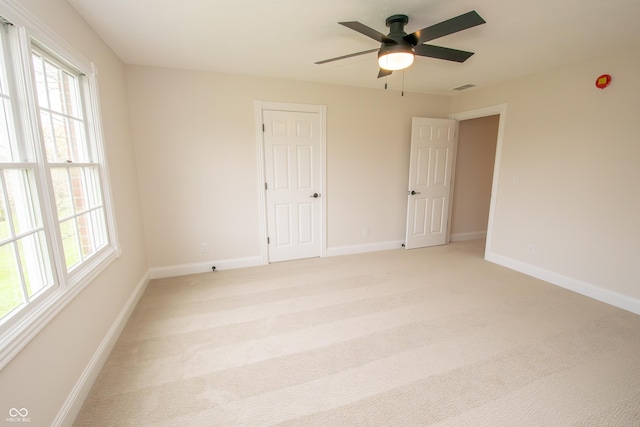 12520 E Stanley Rd, Selma, IN 47383 - interior space with baseboards, plenty of natural light, and ceiling fan