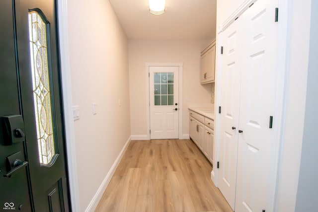 12520 E Stanley Rd, Selma, IN 47383 - entryway featuring light wood-style floors and baseboards