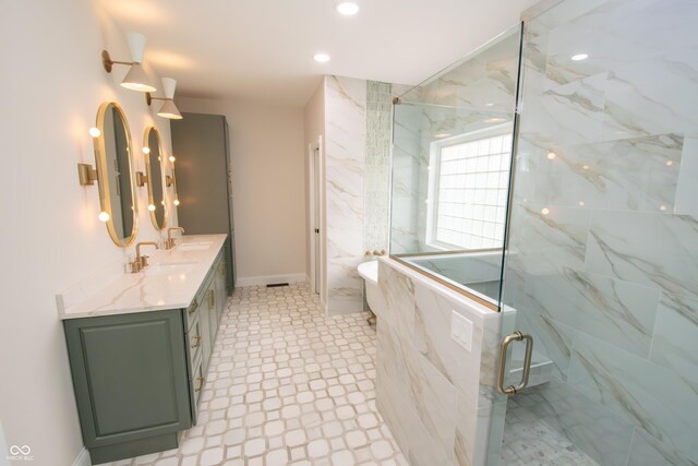 12520 E Stanley Rd, Selma, IN 47383 - bathroom featuring a freestanding tub, baseboards, vanity, tile patterned floors, and a marble finish shower