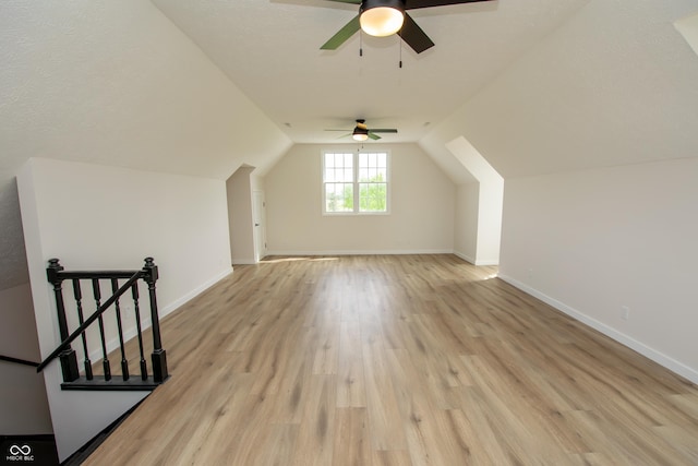 12520 E Stanley Rd, Selma, IN 47383 - bonus room with baseboards, light wood finished floors, ceiling fan, and vaulted ceiling