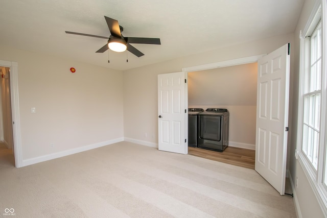 12520 E Stanley Rd, Selma, IN 47383 - empty room with a healthy amount of sunlight, separate washer and dryer, baseboards, and a ceiling fan