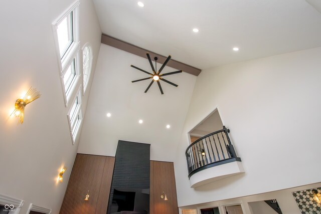 12520 E Stanley Rd, Selma, IN 47383 - unfurnished living room with high vaulted ceiling, a ceiling fan, and recessed lighting