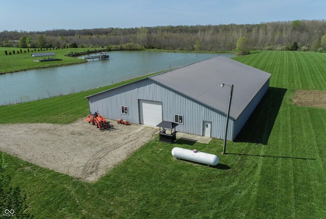 12520 E Stanley Rd, Selma, IN 47383 - view of pole building featuring a yard, a water view, and driveway