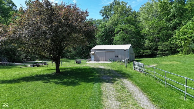 3282 S Conservation Club Rd, Morgantown, IN 46160 - view of yard with an outbuilding, an outdoor structure, driveway, and a view of countryside
